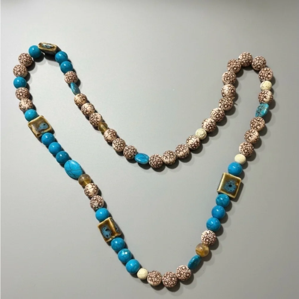 Elegant Blue and Cream Beaded Necklace